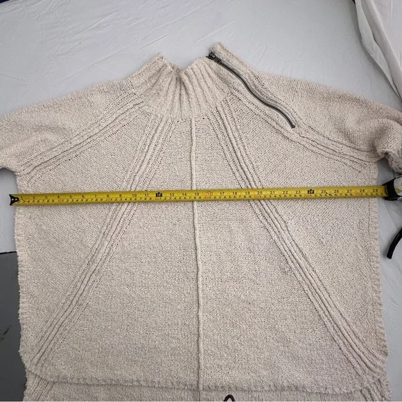 Free People Spin Around Poncho Top in an off-white cream color - Picture 8 of 10